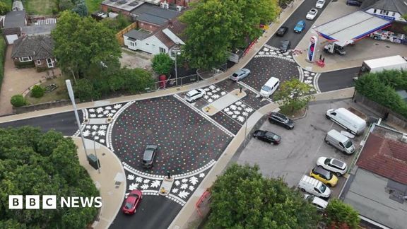 Colourful roundabout redesign divides village