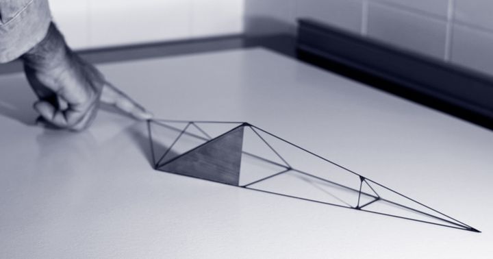 A new pyramid-like shape always lands the same side up
