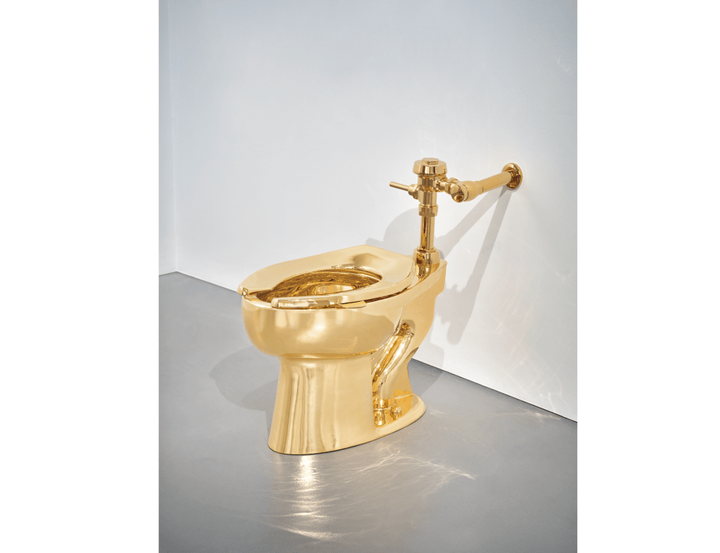 Maurizio Cattelan Golden Toilet Sells for $12.1m At Sotheby's