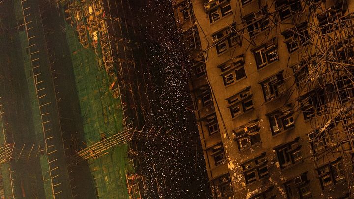 Bamboo scaffolding helped build Hong Kong's skyline, but deadly fire may end it